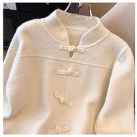 ニットトップス イレギュラーチャイナボタン